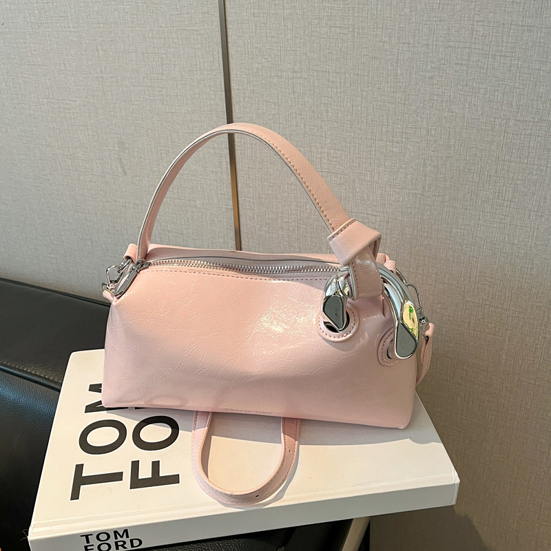 حقيبة يد نسائية أنيقة من الجلد - مراجعة Top Handle Patent Bag وسعره
